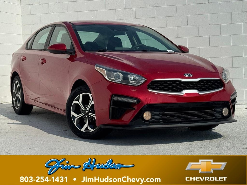 2020 Kia Forte LXS in Currant Red — front three-quarter view